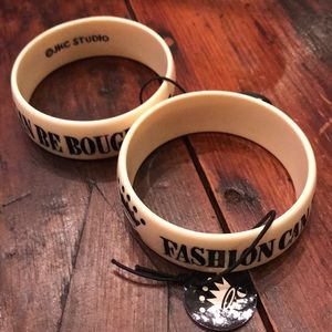 Two bangle fashion bracelets with tags